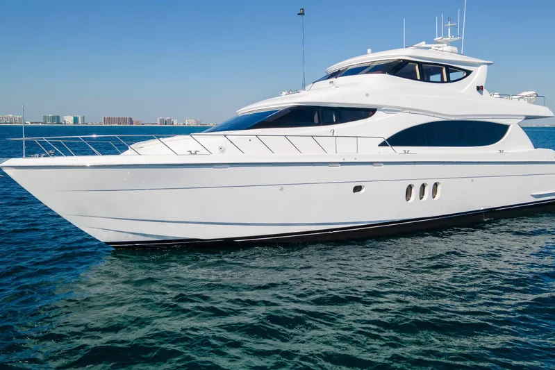 Time-2 Fly Yacht Photos Pics 2006 Hatteras 80 Motor Yacht Sky Lounge cruising on open water.