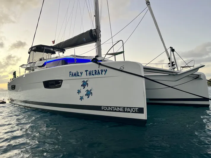 Family Therapy Yacht Photos Pics Fountaine Pajot Elba 45 catamaran named "Family Therapy" on water, 2023 model.