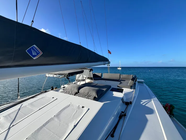 Family Therapy Yacht Photos Pics 2023 Fountaine Pajot Elba 45 catamaran on calm sea with clear blue sky.