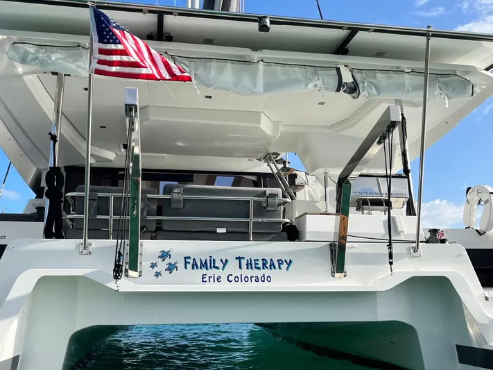 Family Therapy Yacht Photos Pics 2023 Fountaine Pajot Elba 45 catamaran named "Family Therapy" with American flag, Erie Colorado.