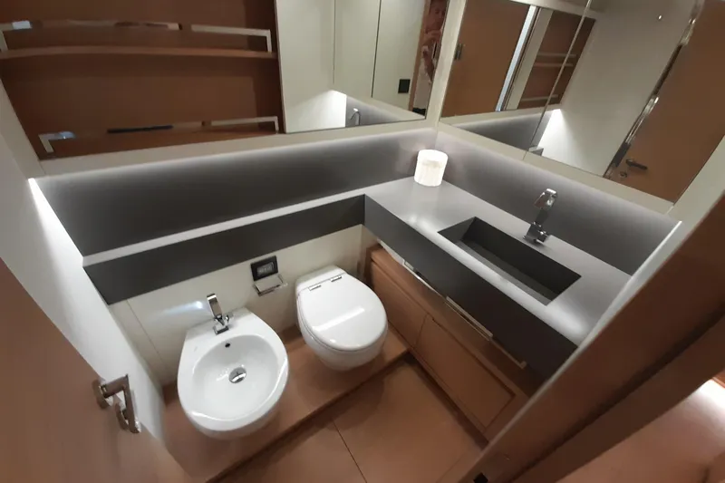  Yacht Photos Pics Luxurious bathroom in 2023 Pardo Yachts E60, featuring modern fixtures and sleek design.