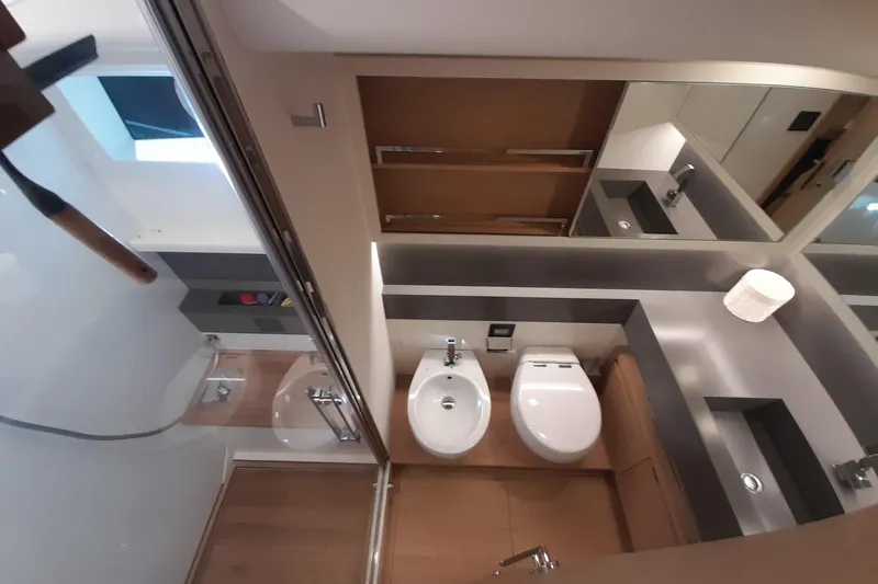 Yacht Photos Pics Luxurious bathroom interior of 2023 Pardo Yachts E60, featuring modern fixtures and sleek design.