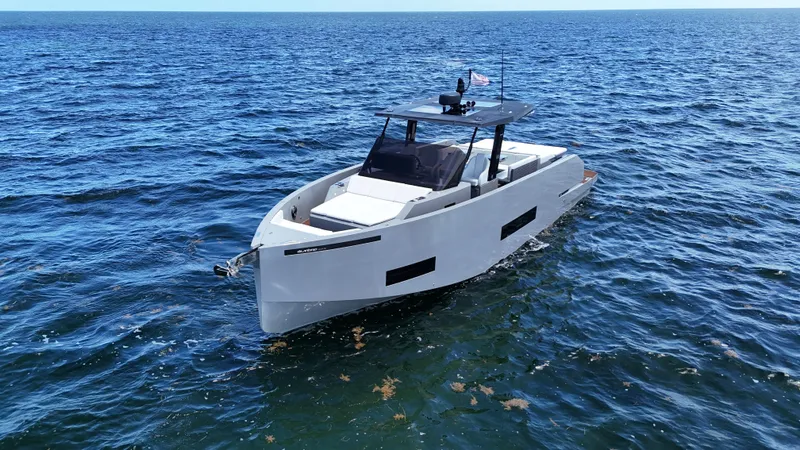  Yacht Photos Pics 2021 De Antonio Yachts D42 cruising on open water, showcasing sleek design and luxury features.