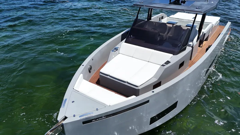  Yacht Photos Pics 2021 De Antonio Yachts D42 cruising on clear blue water.