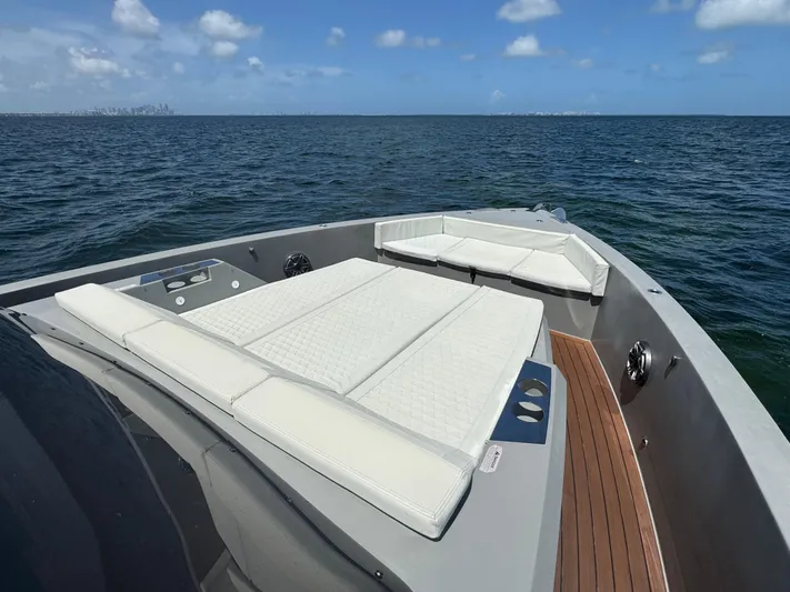  Yacht Photos Pics Luxurious 2021 De Antonio Yachts D42 with spacious sunbathing area on open water.