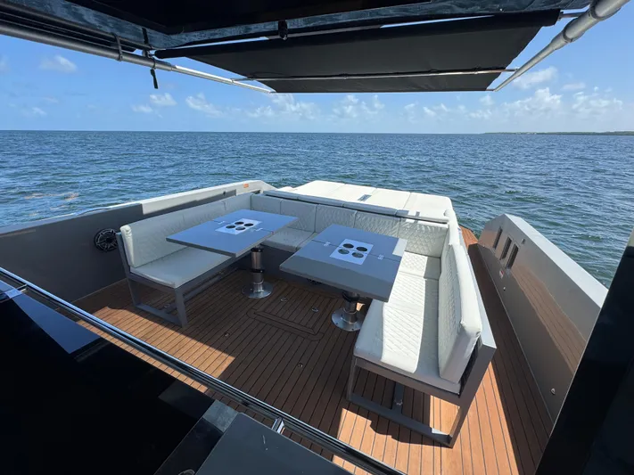  Yacht Photos Pics Luxury seating area on 2021 De Antonio Yachts D42, overlooking the ocean.