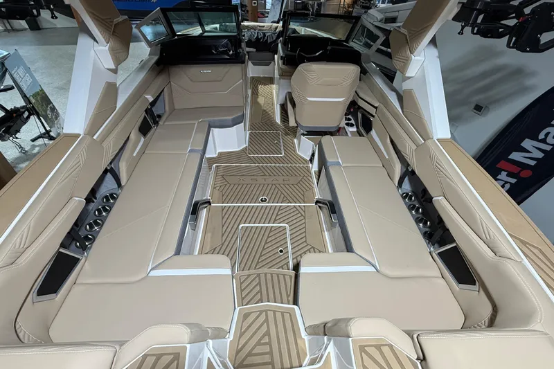  Yacht Photos Pics 2025 MasterCraft XStar 23 interior with beige seating and modern design.