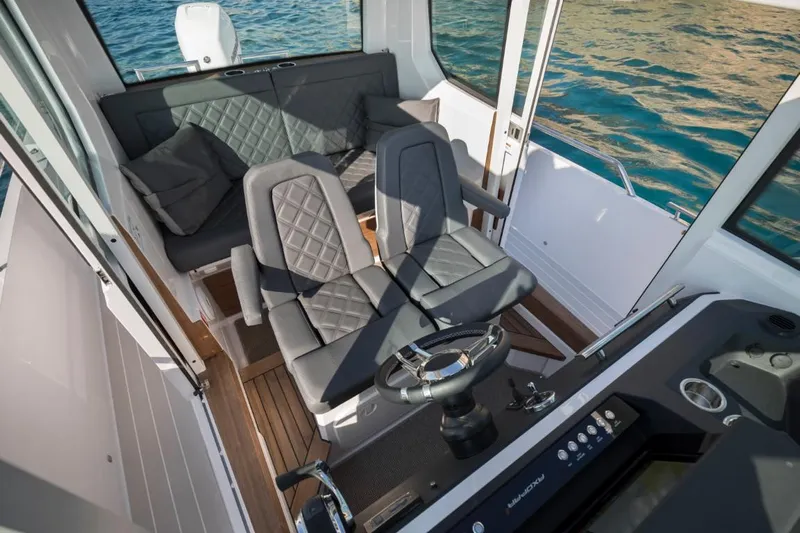  Yacht Photos Pics Interior of 2022 Axopar 28 CABIN with modern seating.