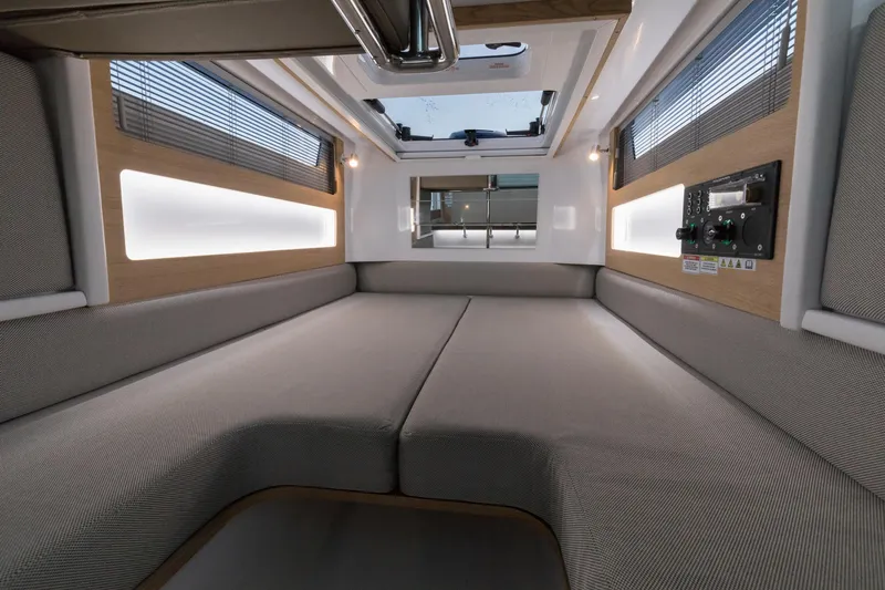  Yacht Photos Pics Interior of 2022 Axopar 28 CABIN with comfortable sleeping area.