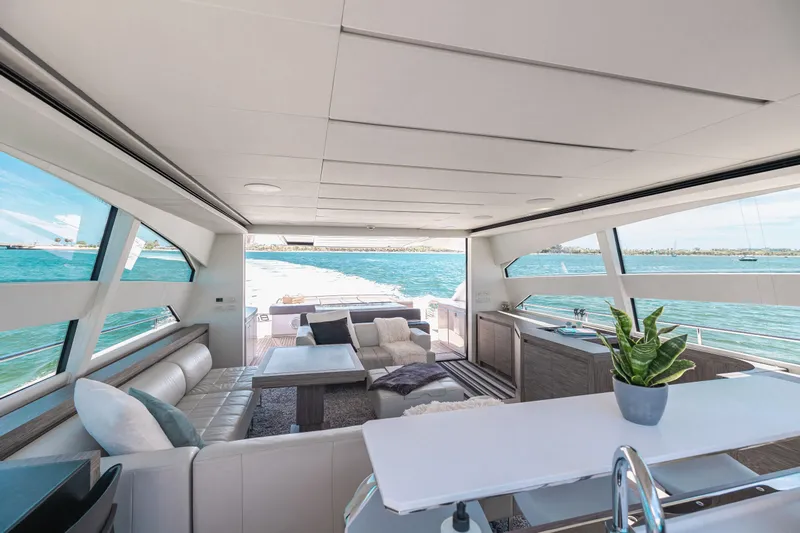 Double Or Nothing Yacht Photos Pics Luxurious interior of 2017 Pershing 82 VHP yacht with ocean view.