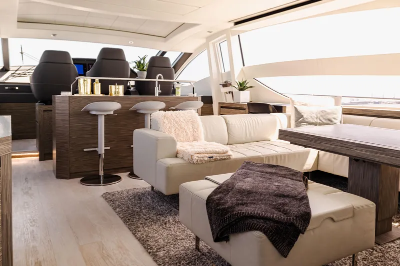 Double Or Nothing Yacht Photos Pics Luxurious interior of a 2017 Pershing 82 VHP yacht with modern furnishings.