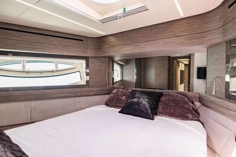 Double Or Nothing Yacht Photos Pics Luxurious bedroom interior of 2017 Pershing 82 VHP yacht with modern design.