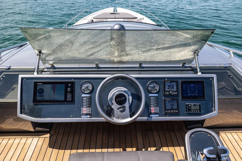 Double Or Nothing Yacht Photos Pics Cockpit of 2017 Pershing 82 VHP yacht with advanced navigation controls.