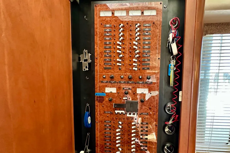  Yacht Photos Pics Electrical control panel on a 2005 Silverton 43 Motor Yacht, featuring switches and gauges.