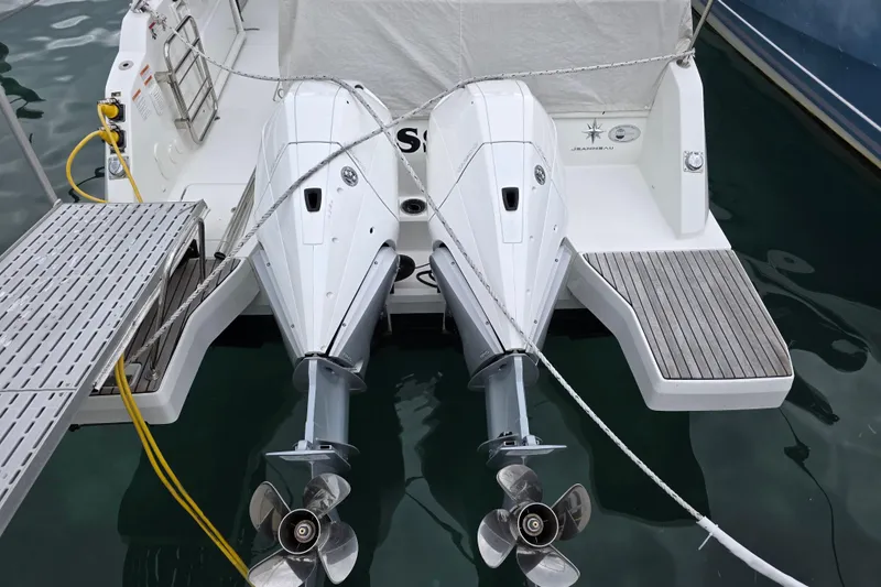  Yacht Photos Pics 2022 Jeanneau Leader 10.5 WA Series 2 with dual outboard motors at dock.