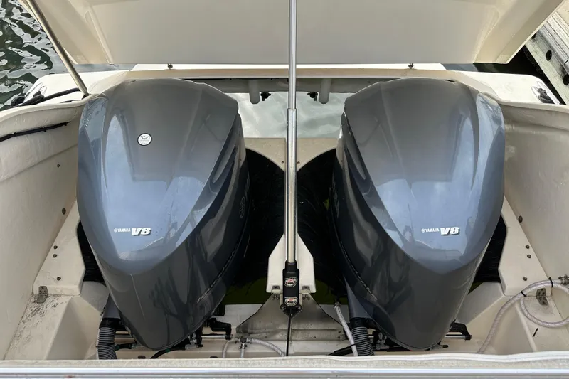 Yolo Or 2 Yacht Photos Pics Twin Yamaha V8 engines on a 2014 Pursuit SC 365i Sport Coupe boat.