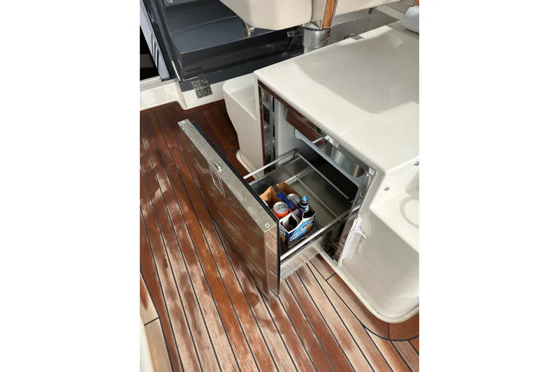 Yolo Or 2 Yacht Photos Pics Open drawer fridge on 2014 Pursuit SC 365i Sport Coupe with drinks inside.