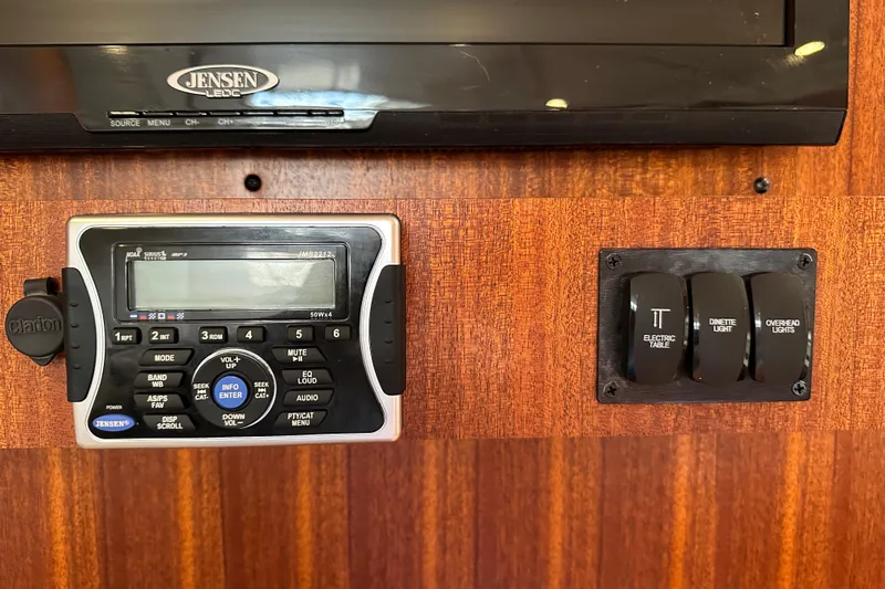Yolo Or 2 Yacht Photos Pics Control panel and switches in a 2014 Pursuit SC 365i Sport Coupe boat.