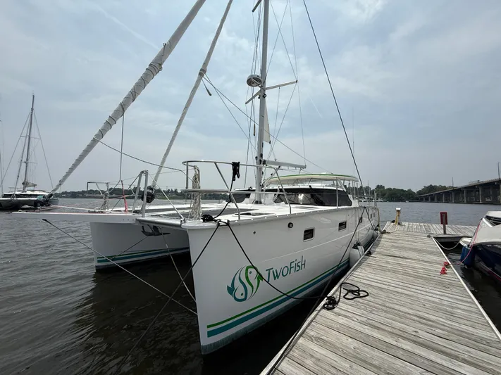 Two Fish Yacht Photos Pics 2021 Antares 44GS catamaran docked, featuring sleek design and modern amenities.