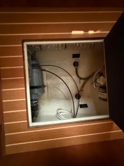 Two Fish Yacht Photos Pics Engine compartment of 2021 Antares 44GS yacht, showcasing internal components and wiring.