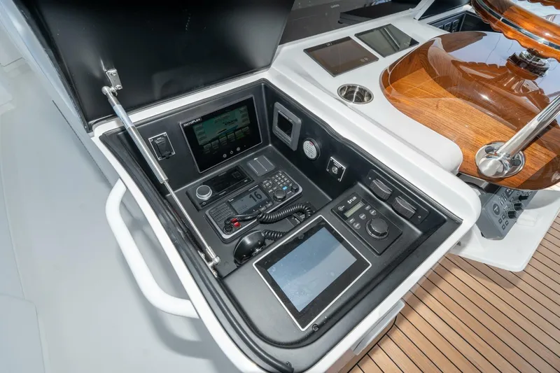 Zatara Yacht Photos Pics Control panel of 2025 Viking 90 Convertible yacht with advanced navigation systems.