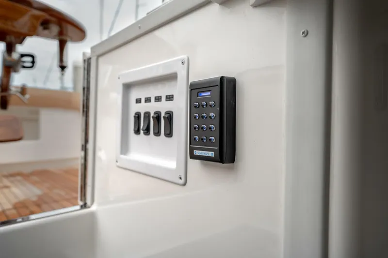 Zatara Yacht Photos Pics Control panel and keypad on 2025 Viking 90 Convertible yacht interior.
