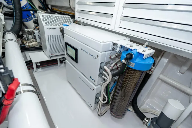Zatara Yacht Photos Pics Engine room of 2025 Viking 90 Convertible yacht with advanced filtration system.
