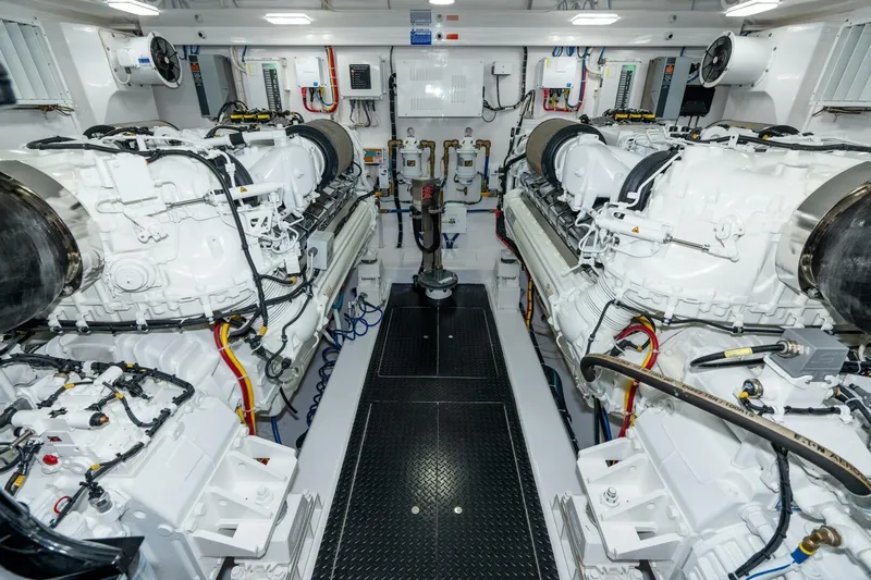 Zatara Yacht Photos Pics Engine room of 2025 Viking 90 Convertible yacht, featuring advanced machinery and clean layout.