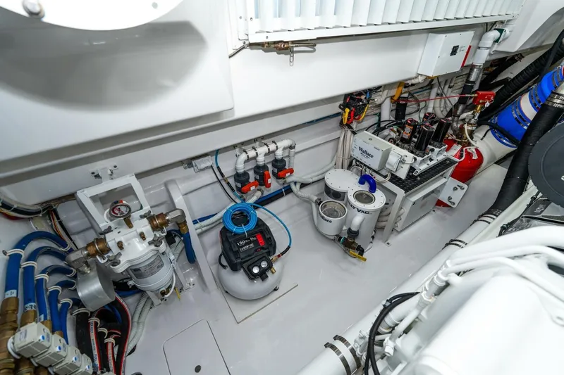 Zatara Yacht Photos Pics Engine room of 2025 Viking 90 Convertible yacht with advanced machinery and equipment.