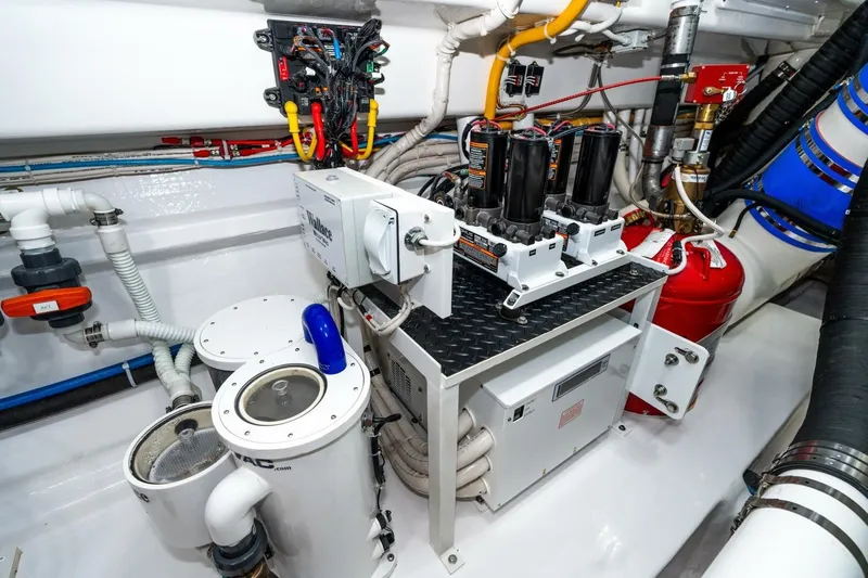 Zatara Yacht Photos Pics Engine room of 2025 Viking 90 Convertible yacht with advanced machinery and wiring.