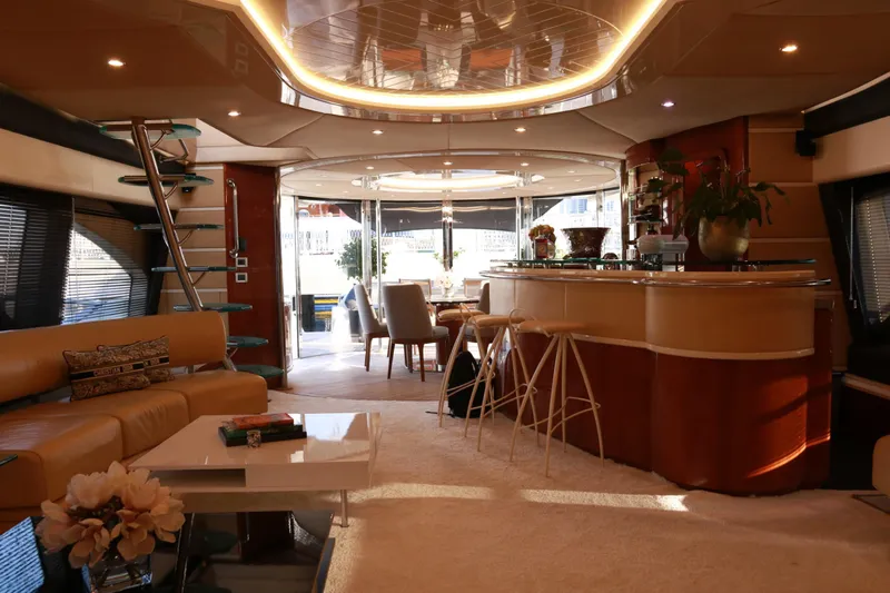 Simona Yacht Photos Pics Luxurious interior of 2003 Azimut 98 Leonardo yacht with elegant seating and modern decor.