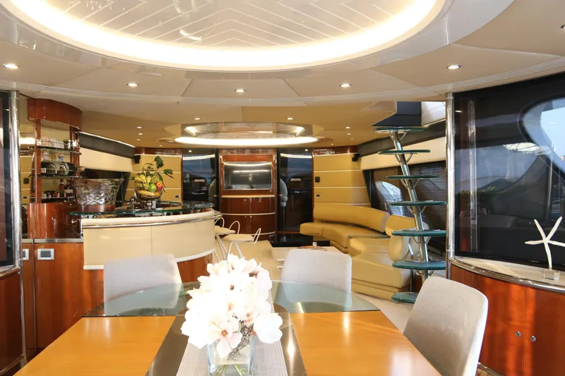 Simona Yacht Photos Pics Luxurious interior of 2003 Azimut 98 Leonardo yacht with elegant dining and lounge area.