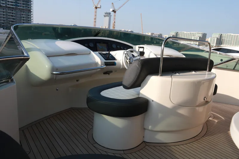 Simona Yacht Photos Pics Helm of 2003 Azimut 98 Leonardo yacht with modern controls and seating.
