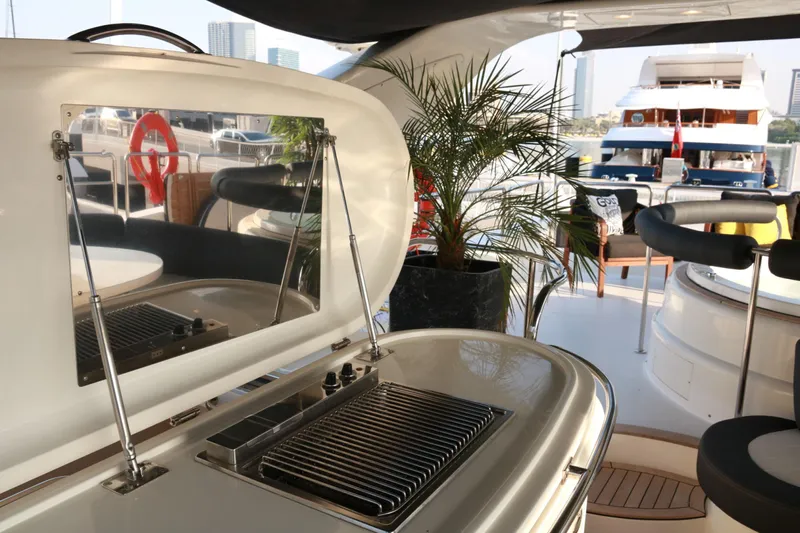 Simona Yacht Photos Pics Luxury yacht Azimut 98 Leonardo 2003 with outdoor grill and seating area.