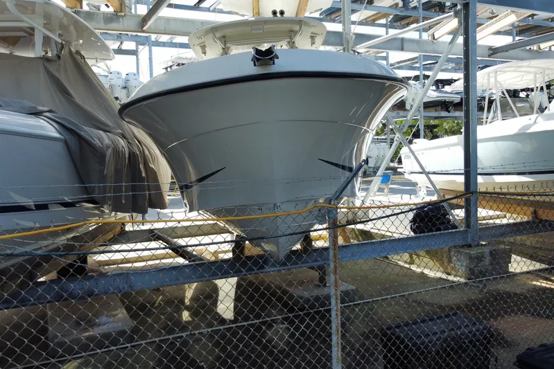  Yacht Photos Pics 2008 Hydra-Sports Vector 2900 CC boat stored in a marina rack.