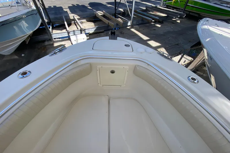  Yacht Photos Pics 2008 Hydra-Sports Vector 2900 CC boat interior with cushioned seating and storage.