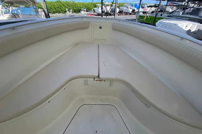  Yacht Photos Pics 2008 Hydra-Sports Vector 2900 CC boat interior with cushioned seating and storage.