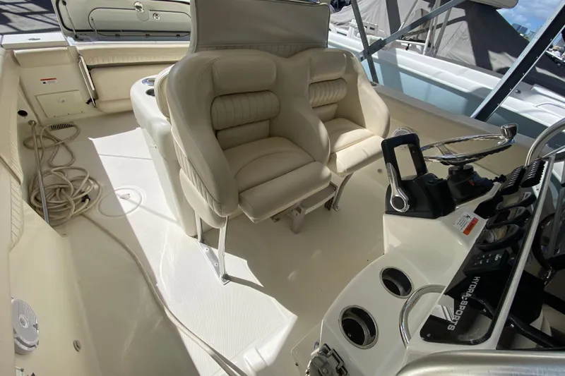  Yacht Photos Pics 2008 Hydra-Sports Vector 2900 CC boat interior with helm and seating area.