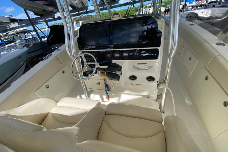  Yacht Photos Pics 2008 Hydra-Sports Vector 2900 CC boat cockpit with steering wheel and control panel.