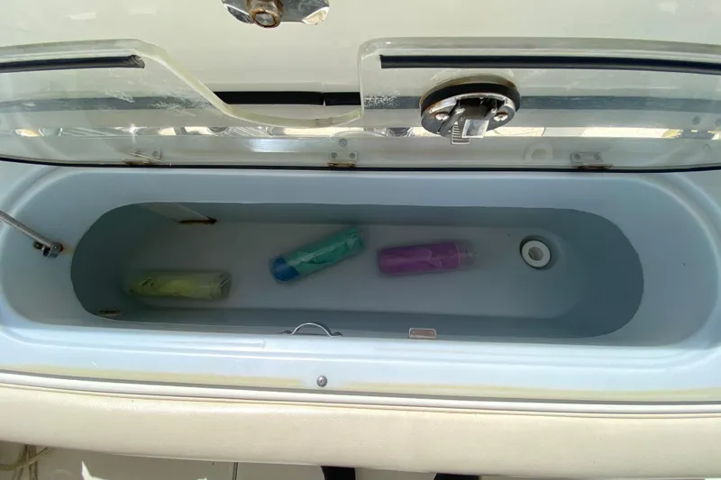  Yacht Photos Pics Livewell on 2008 Hydra-Sports Vector 2900 CC boat with colorful bottles inside.