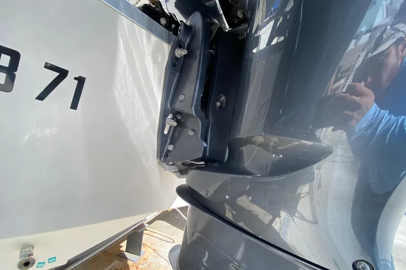  Yacht Photos Pics 2008 Hydra-Sports Vector 2900 CC boat engine close-up with reflective surface.