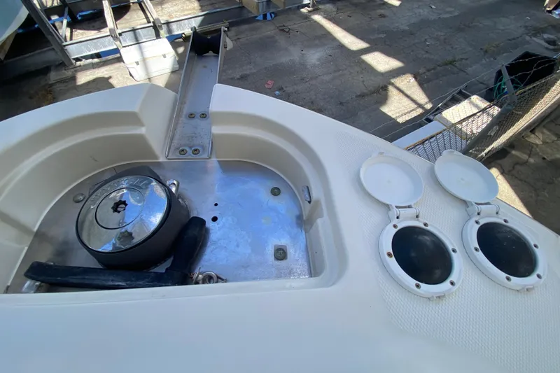  Yacht Photos Pics 2008 Hydra-Sports Vector 2900 CC boat deck with winch and storage compartments.