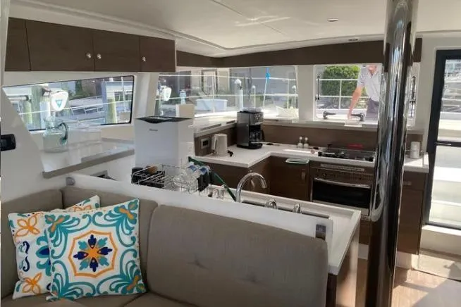 Nauti Habit Yacht Photos Pics Modern kitchen interior on 2023 Bali 4.2 yacht with stylish decor and appliances.