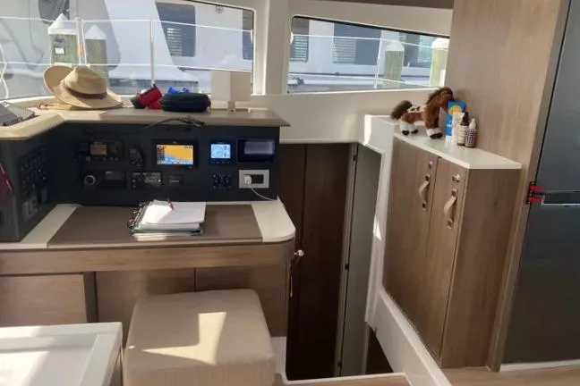 Nauti Habit Yacht Photos Pics Interior of 2023 Bali 4.2 yacht with navigation station and storage cabinets.