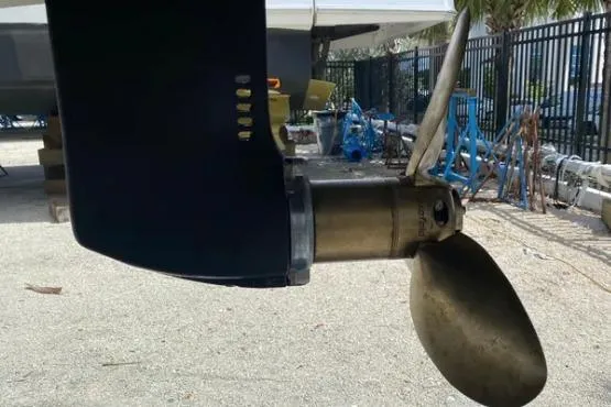 Nauti Habit Yacht Photos Pics Propeller of 2023 Bali 4.2 yacht on display in a marina setting.