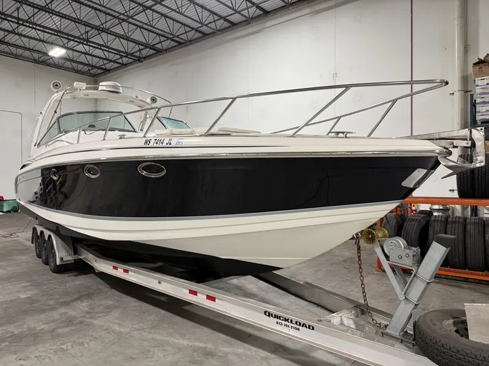 Prime Time Yacht Photos Pics 2005 Formula 370 Super Sport boat on trailer in warehouse.