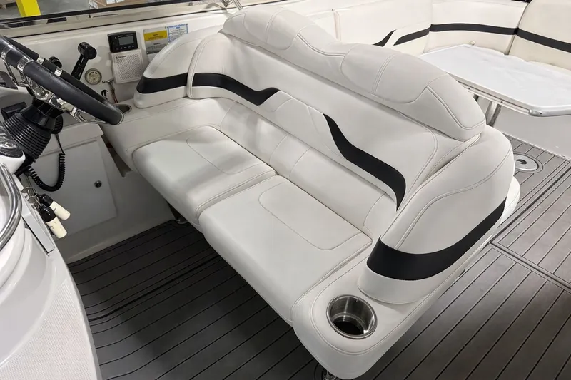 Prime Time Yacht Photos Pics Interior of a 2005 Formula 370 Super Sport boat with white leather seating.