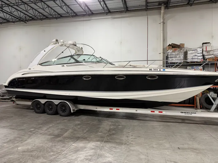 Prime Time Yacht Photos Pics 2005 Formula 370 Super Sport boat in warehouse on trailer.