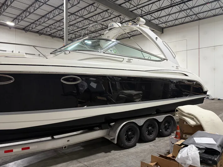 Prime Time Yacht Photos Pics 2005 Formula 370 Super Sport boat in warehouse on trailer.