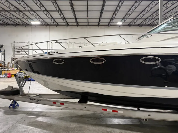 Prime Time Yacht Photos Pics 2005 Formula 370 Super Sport boat in warehouse on trailer.